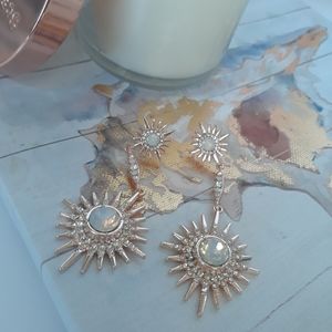 Rose starburst earring with clear stone